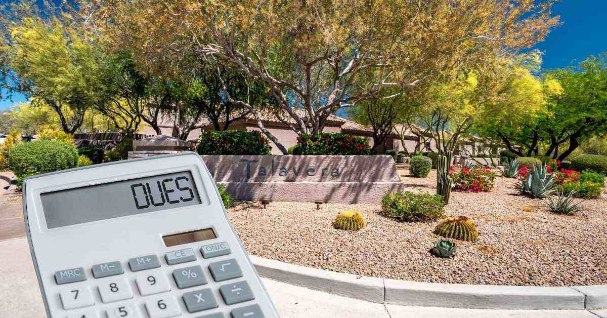 A calculator with the word Dues in front of the entrance of Talavera Scottsdale condominiums.