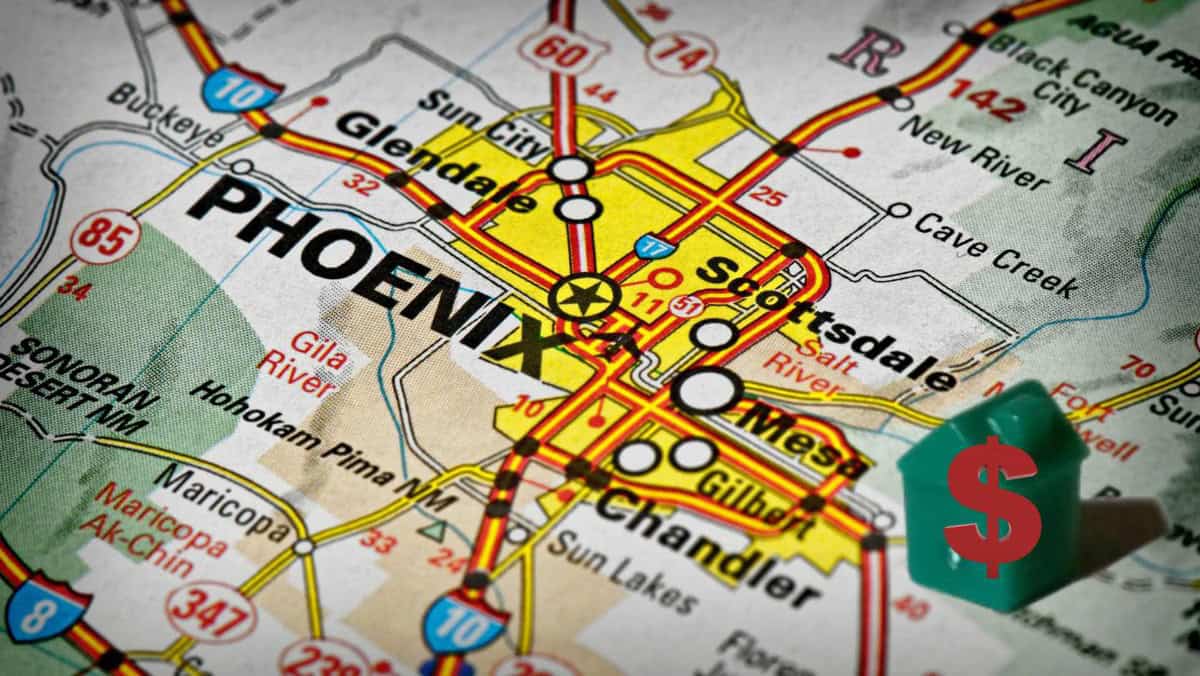 A map of Phoenix, Cave Creek, and Scottsdale real estate with a green monopoly house with a red dollar sign on it.