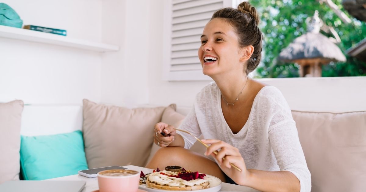 A happy Scottsdale home owner having a snack