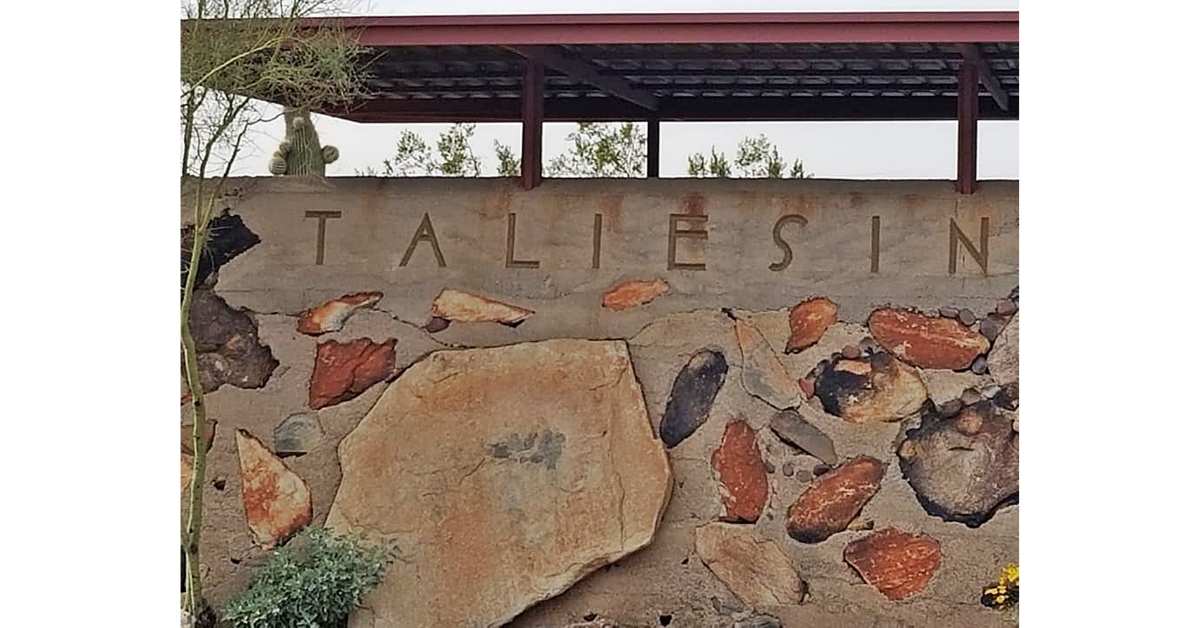 An organic entry of stone and concrete to Taliesin West