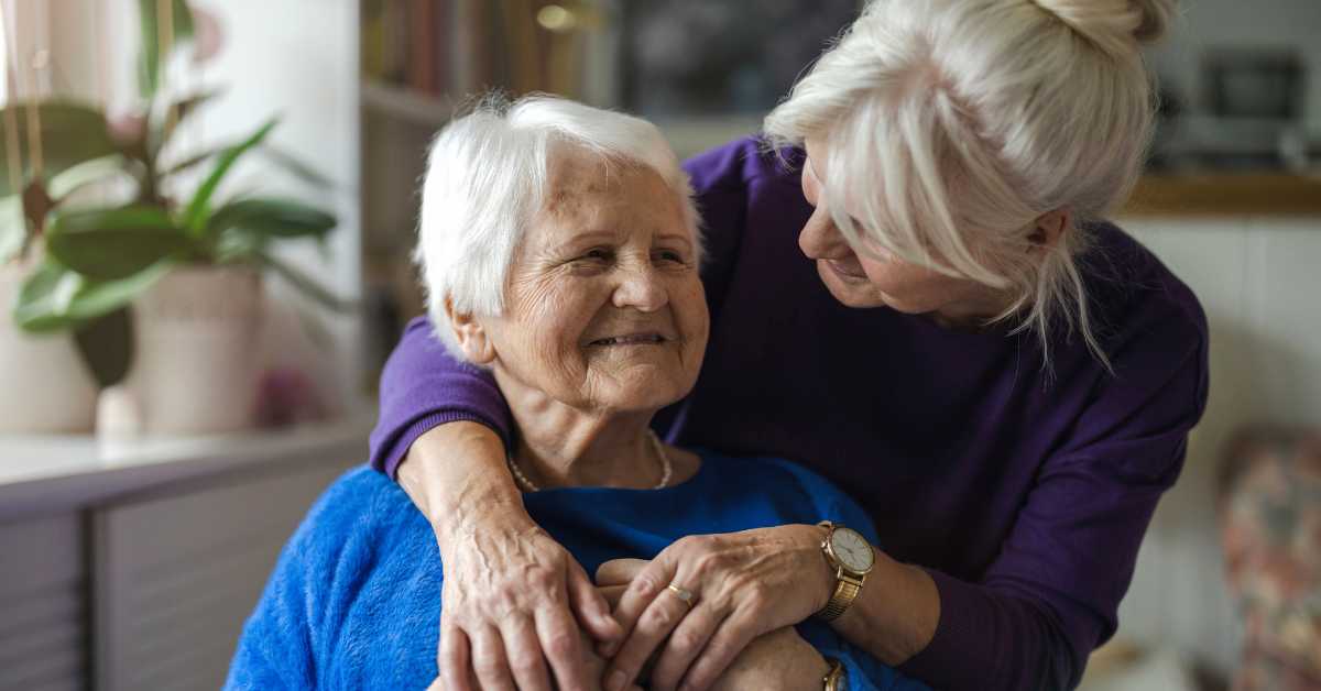 An older woman with her mother in their shared Scottsdale home