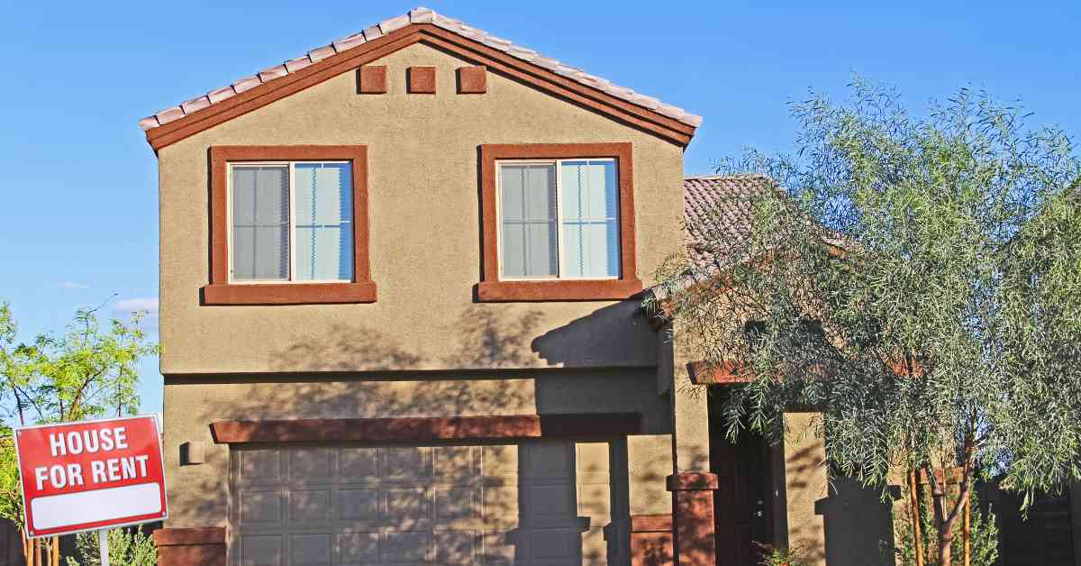 A Scottsdale home with a For Rent sign in front