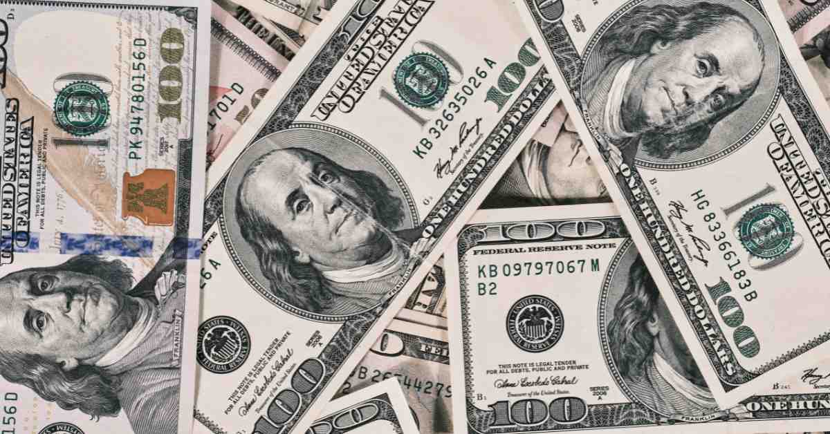 Many hundred dollar bills