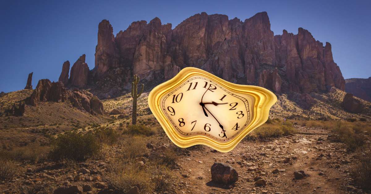 A melting clock in front of the Superstition Mountains in Arizona