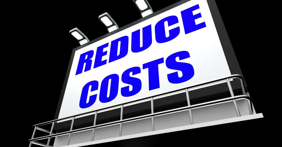 A lighted sign with Reduce Costs written in blue