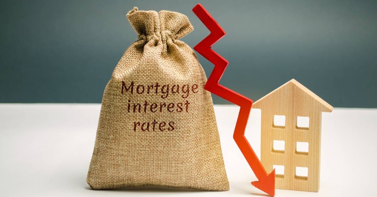 A sack with Mortgage rates on it and a red down arrow