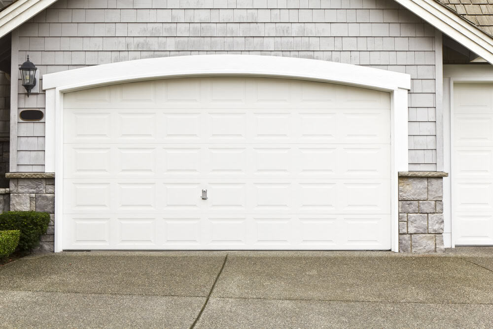 A white 2-car garage door in a Scottsdale home for sale